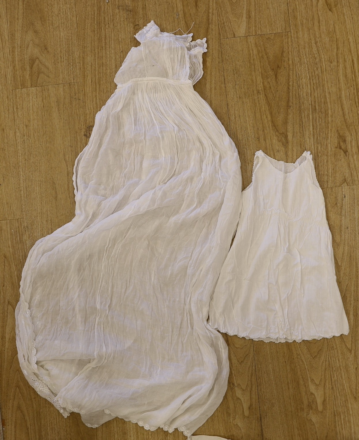 A collection of 19th century cutwork and Ayrshire christening gowns